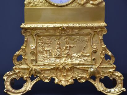 null Clock in gilt bronze representing a romantic scene. Ht 40 cm .