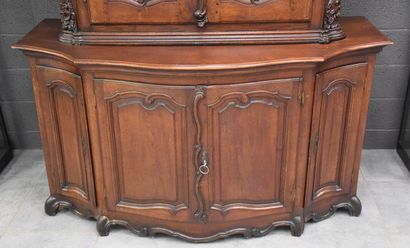 null Double molded oak body opening on 6 doors in total and decorated with beautiful...