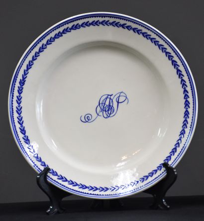 null Set of 4 Tournai porcelain plates with central monogram decoration.