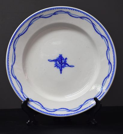 null Two Tournai porcelain plates decorated with shooting prizes .