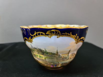 null Cup and saucer in Meissen porcelain on a blue and gold background with central...