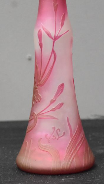 null A multi-layered art nouveau vase with acid-etched floral decoration. Signature...