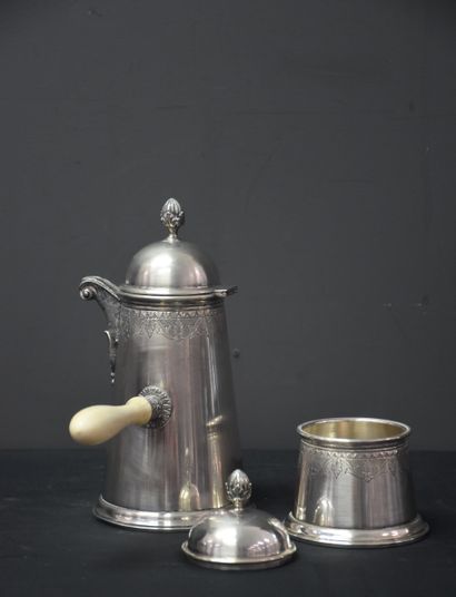 null Coffee pot with side handle and its covered sugar bowl all in engraved silver...