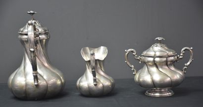 null House Wolfers. Coffee pot marabout, covered sugar bowl and milk pot in silver...