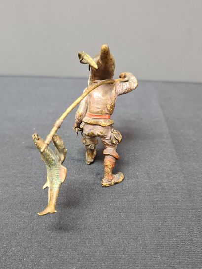 null 
Bronze of Vienna, the dwarf carp fisherman. The carps are hanging on with a...