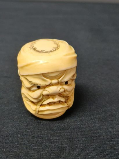 null Japanese ivory bust and a Noh mask pendant. 19th century period. Height : 4...