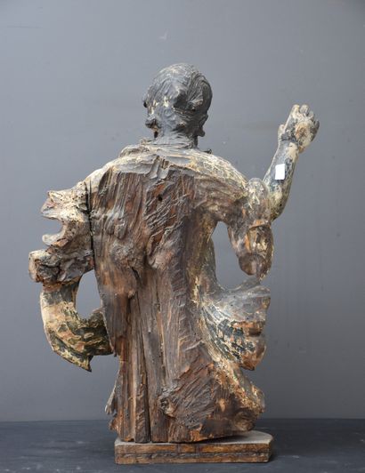 null Saint en bois sculpté et polychromé, XVII ème siècle. Ht : 54 cm.