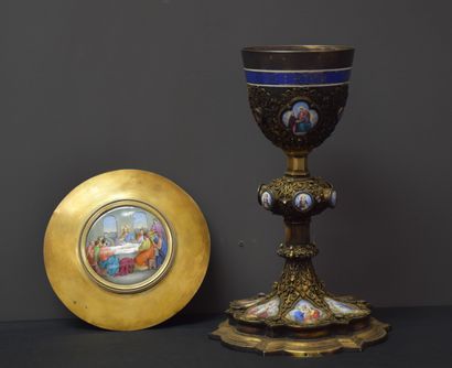 null 
Neo-Gothic chalice and its silver paten. The work is enriched with 16 plates...