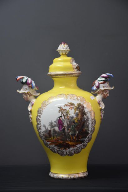 null German porcelain vase with yellow background and handles in the shape of helmeted...