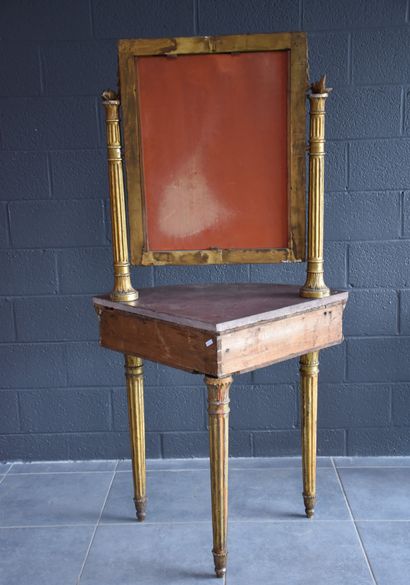 null Empire style giltwood corner console. Porphyry shelf. Height : 164 cm.