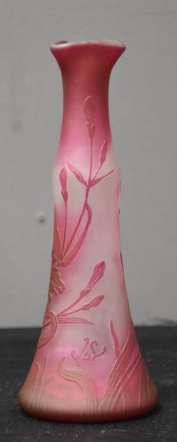 null A multi-layered art nouveau vase with acid-etched floral decoration. Signature...