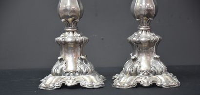 null A pair of silver rocaille style candlesticks. Austrian-Hungarian hallmarks 19th...