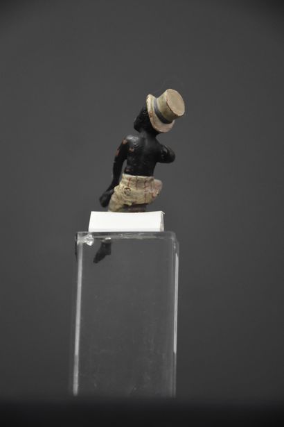 null Small African smoker in bronze from Vienna (missing pipe). Height : 7 cm.