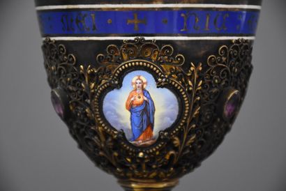 null 
Neo-Gothic chalice and its silver paten. The work is enriched with 16 plates...