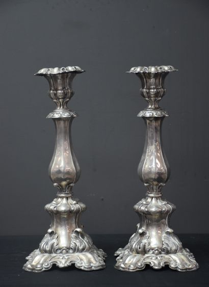 null A pair of silver rocaille style candlesticks. Austrian-Hungarian hallmarks 19th...