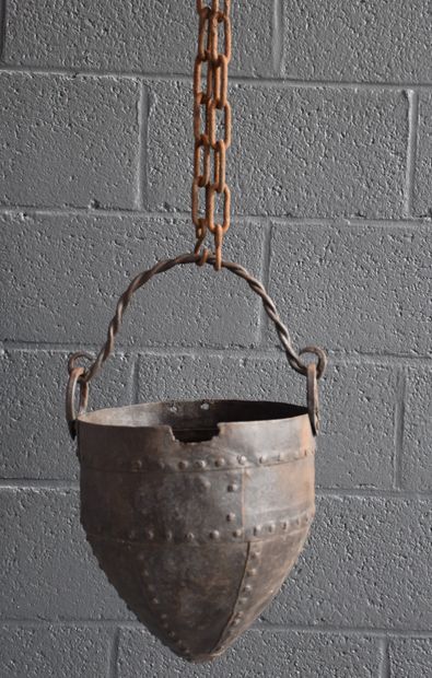 null Riveted iron cauldron, could be from the medieval period. Missing. Chain at...