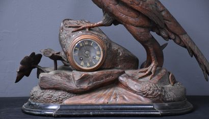 null 
Hunting clock end of the 19th century. Carved wood work of the Black Forest...