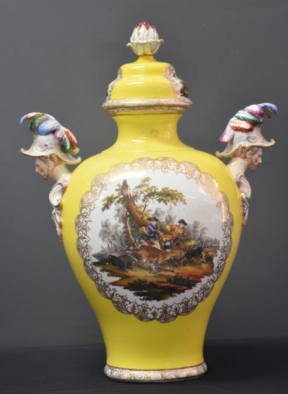 null German porcelain vase with yellow background and handles in the shape of helmeted...