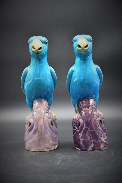 Pair of turquoise ceramic parrots. China...