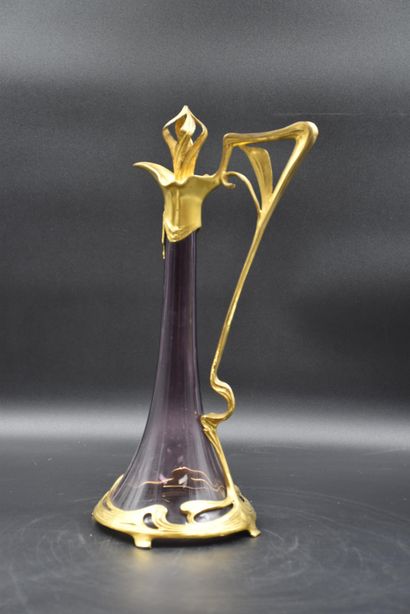 Art nouveau ewer in crystal and gilded metal...
