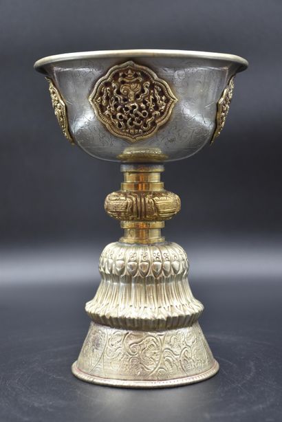 null Chalice probably orthodox in brass and silver metal. Height : 22 cm. Diameter...