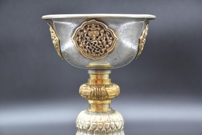 null Chalice probably orthodox in brass and silver metal. Height : 22 cm. Diameter...