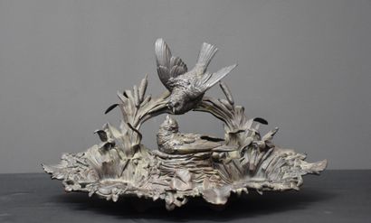 Bronze inkwell with birds at the edge of...