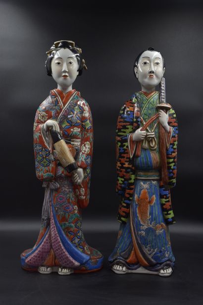 null A pair of Japanese porcelain figures, 19th century, signed on the base. Height...