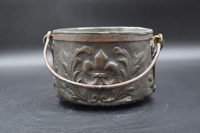 null 18th century copper cauldron with fleur-de-lis, coat of arms decoration and...