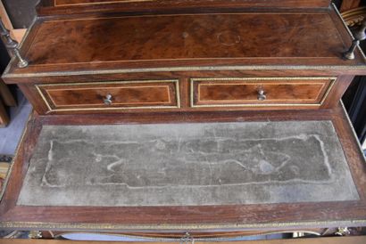 null Napoleon III style ladies desk. French work in veneer and bronze ornaments....