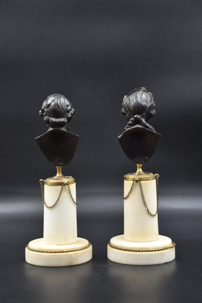 null Pair of 18th century bronze busts, white marble bases representing Henry IV...