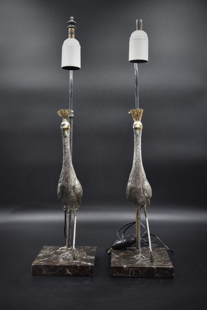 null Pair of lamps about 1950 with decorations of stilt walkers out of silver plated...