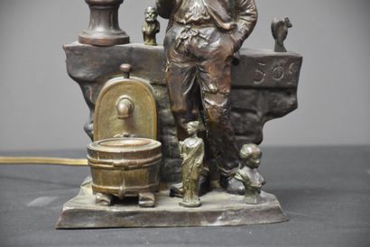 null The junk dealer. Rare and funny chryselephantine sculpture making a lamp. A...