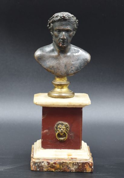 null Pair of antique bronze busts on square marble bases composed of three different...