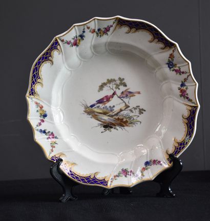 null Nice set of six soup plates in polychrome Tournai porcelain decorated with birds...