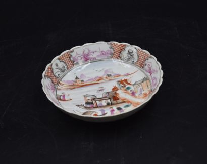 null Chinese porcelain cup and saucer. Famille rose, animated decoration. Minor chip...