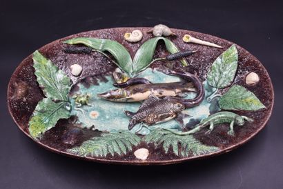 null Suite of Palissy. France XIXth century. Oval dish in majolica decorated with...