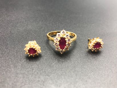 null Gold ring with a ruby stone and a pair of earrings of similar construction....
