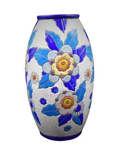 Vase Bock Kéramis en émaux à décor de fleurs....