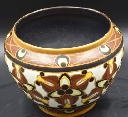 null Boch Kéramis cache-pot with a mat finish decoration of stylized flowers. Monogram...