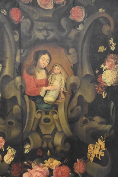 null Vierge à l’enfant entourée d’une guirlande de fleurs. Ecole flamande XVIIème...