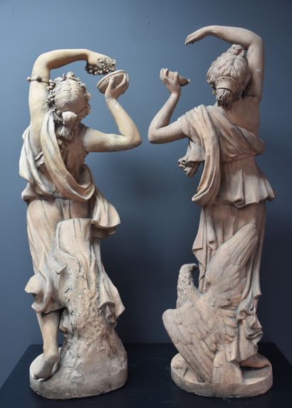 null Pair of terracotta sculptures representing nymphs with grapes in the taste of...