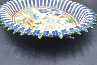 null Suite de Palissy, France XIXth century. Majolica dish decorated with the baptism...