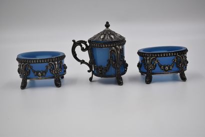null Pair of silver saltcellars and mustard pots with blue crystal interior. Work...