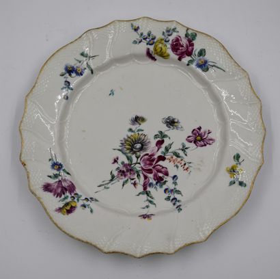 null Plate XVIIIth century in porcelain of Tournai with polychrome decoration of...