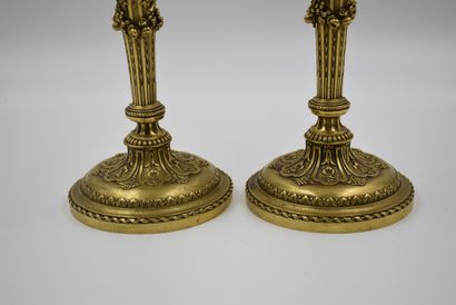 null Pair of ormolu torches in the Regency style. French work of quality in the taste...
