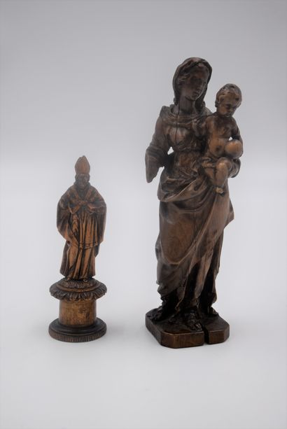 null Madonna and child in carved wood probably around 1700. Height : 18 cm (Misses)....