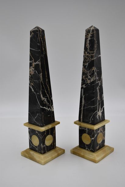 null Pair of Siena marble and black marble obelisks. Purchased in Florence in the...