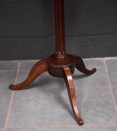 null Small mahogany and lemon wood pedestal table with fluted central shaft resting...