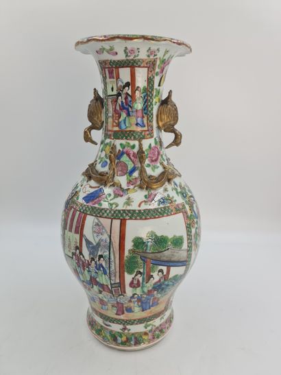 null Porcelain vase of Canton end of XIXth century. Decorated with characters. Handles...